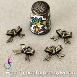 Lot de 6 breloques noeud en...