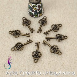 Lot de 8 breloques clé en...