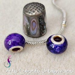 Lot de 2 perles en verre...