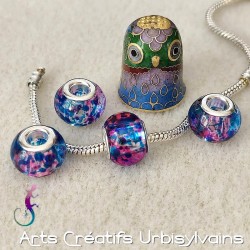 Lot de 4 perles en verre...