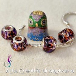 Lot de 4 perles en verre...