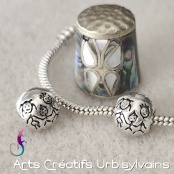 Lot de 2 perles en métal...