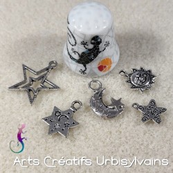 Lot de 5 breloques "cosmos"...