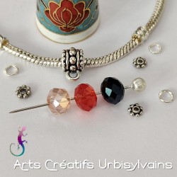 Bélière en métal argenté...