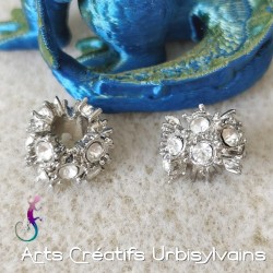 Perle en métal argenté avec...