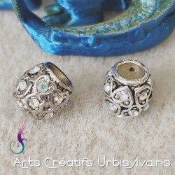 Perle en métal argenté avec...