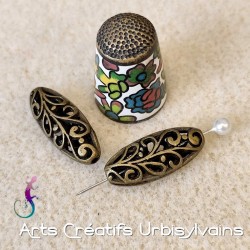 Lot de 2 perles allongées...