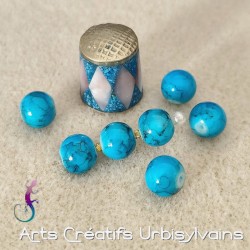 Lot de 15 perles en verre...